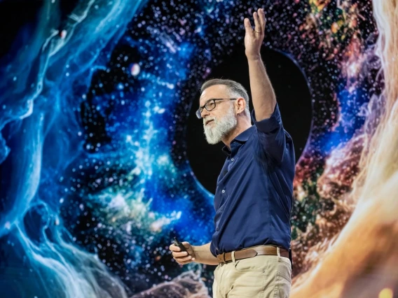 Dante Lauretta behind a science sky